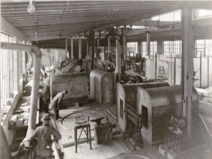 Figure 2 GSMW workers in the 1930s fabricate architectural metal. In the early days the fabricator made roofing and ventilation systems for the University of Notre Dame